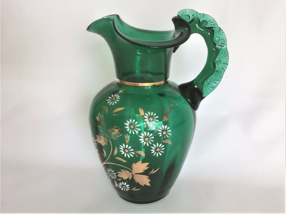A delightful Victorian green enamel painted jug.