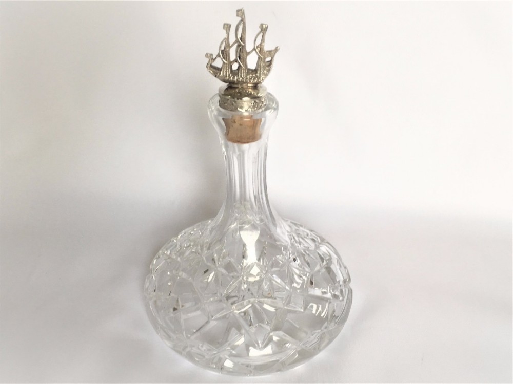 A rare small silver mounted ships' decanter.
