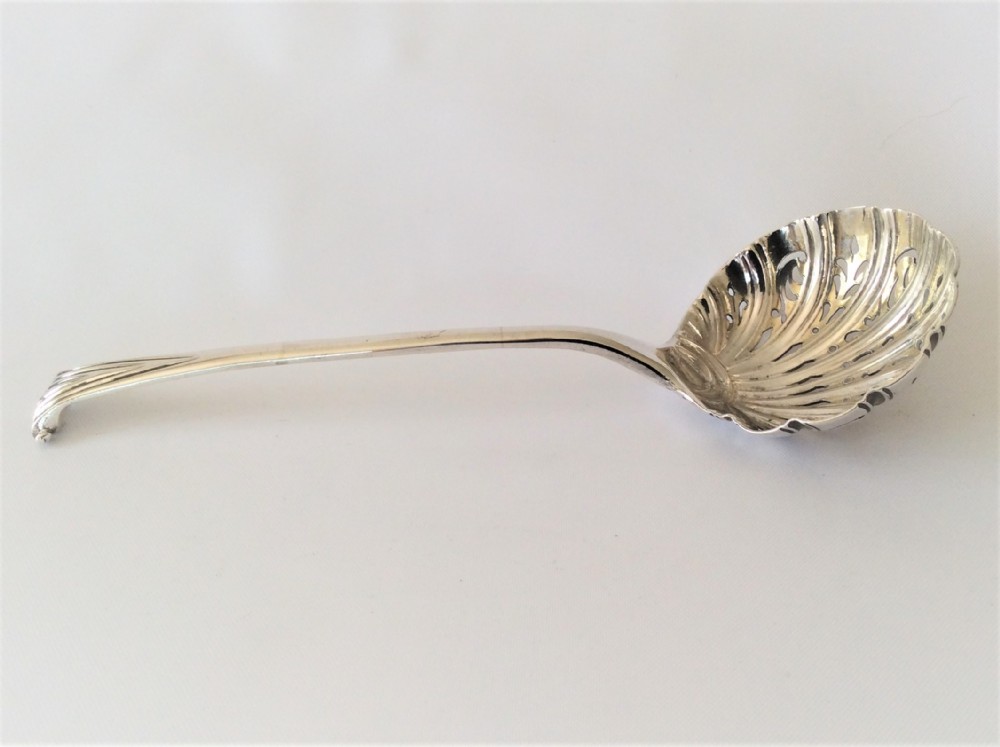 A rare 18th Century Onslow pattern silver sifter spoon.