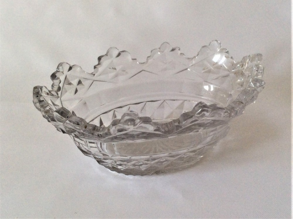 A splendid Regency cut glass condiment boat.