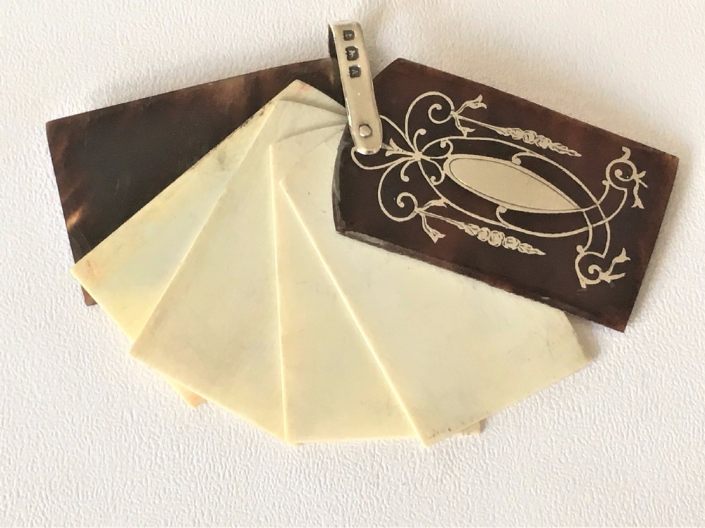 A gorgeous silver & tortoiseshell aide memoire.