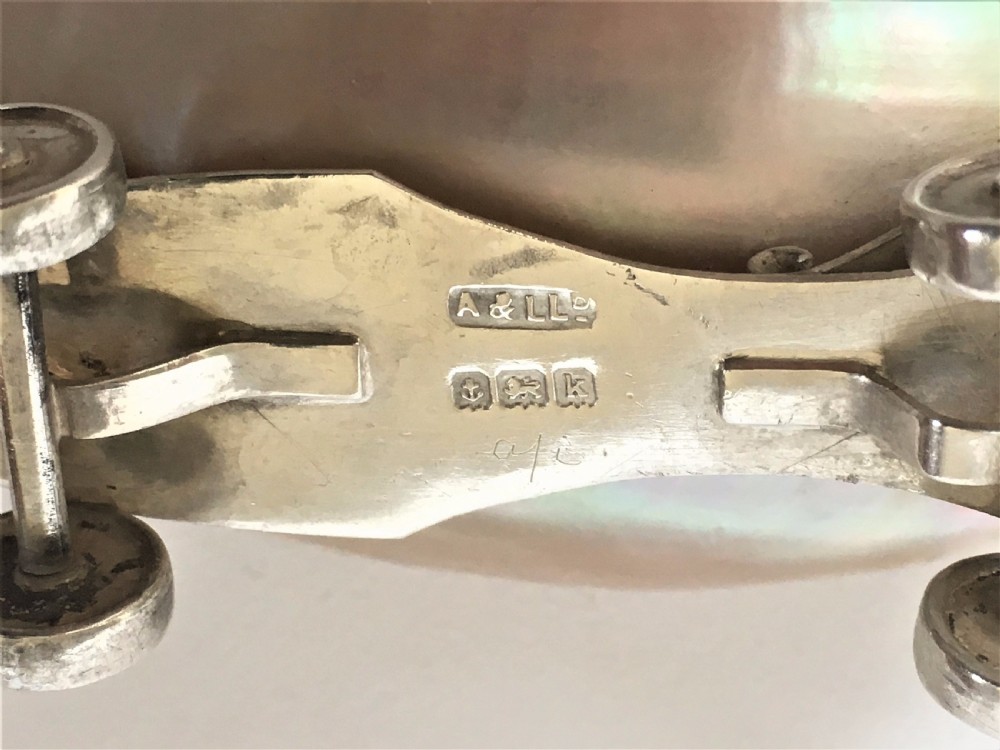 A rare Edwardian novelty silver roller skate thimble holder. View VIII