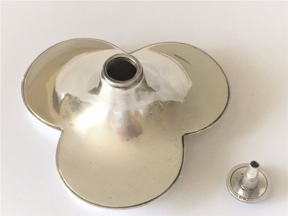 An unusual silver trefoil table lighter. View VIII