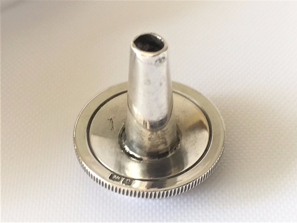 An unusual silver trefoil table lighter. View IX