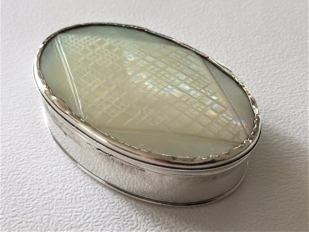 A rare George II silver & mother-of-pearl snuffbox.