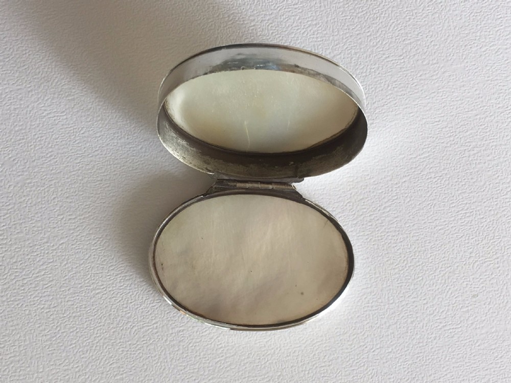 A rare George II silver & mother-of-pearl snuffbox. View VI