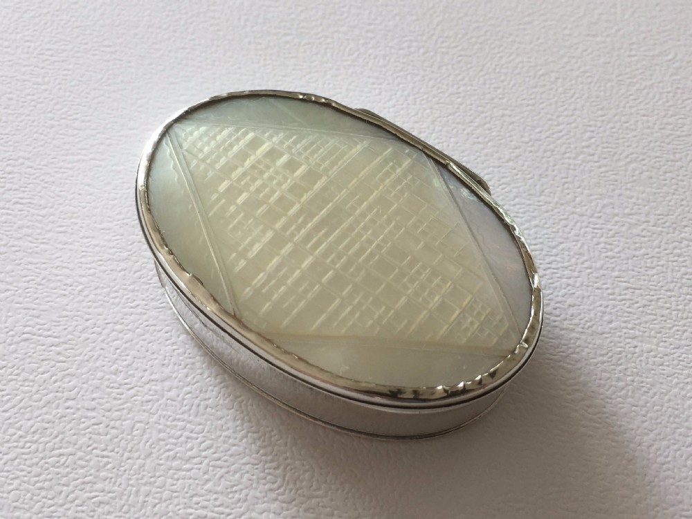 A rare George II silver & mother-of-pearl snuffbox. View XI