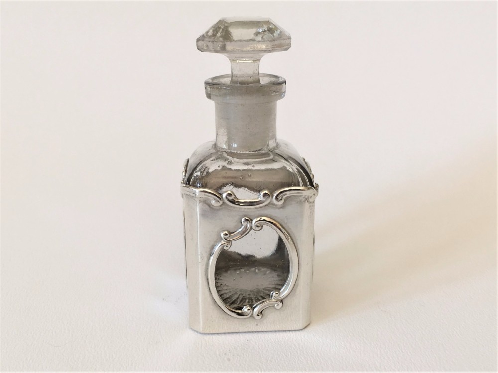 A delightful Art Nouveau silver cased scent bottle. View II