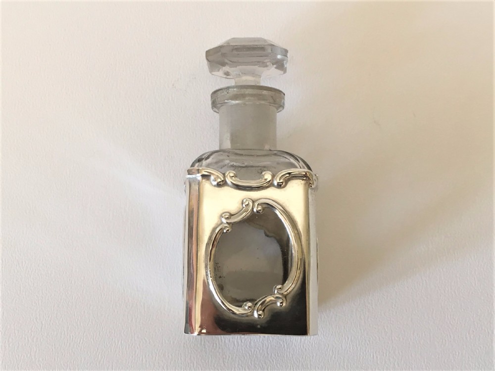 A delightful Art Nouveau silver cased scent bottle. View IV