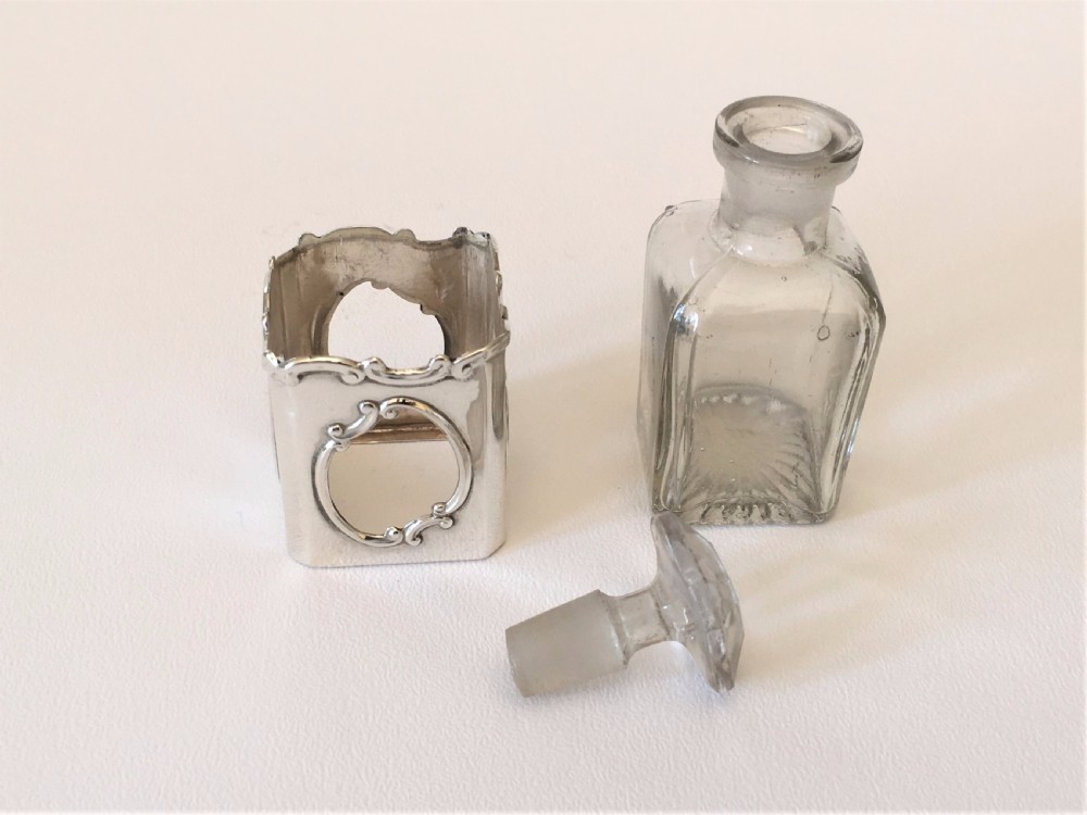A delightful Art Nouveau silver cased scent bottle. View VIII