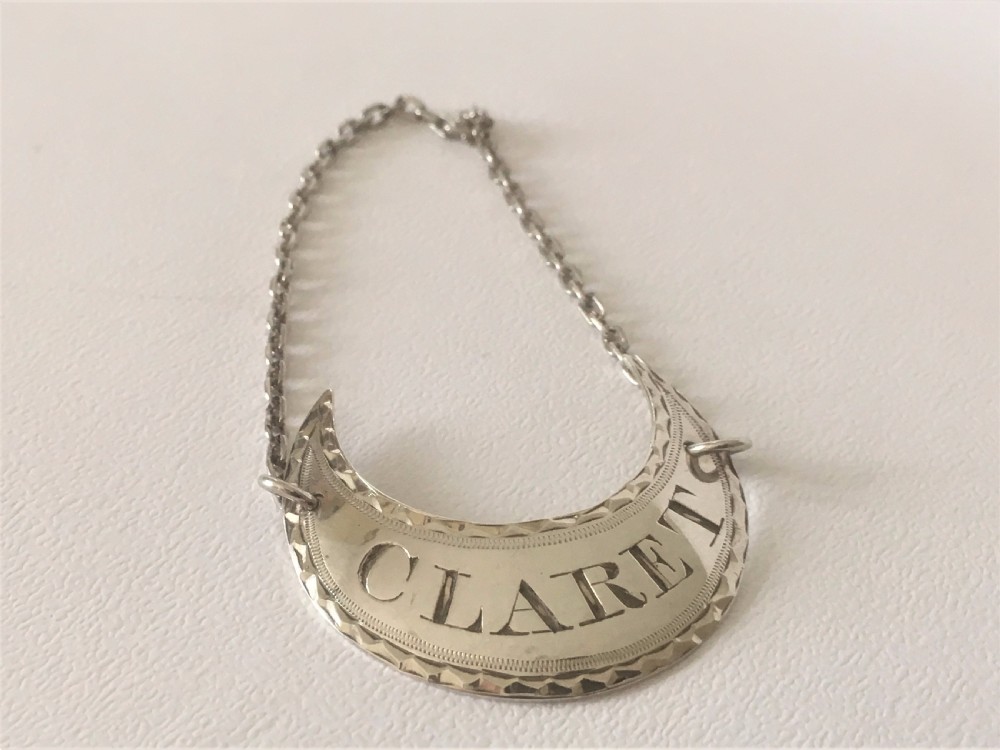 An 18th Century Sheffield silver Claret Label. View II