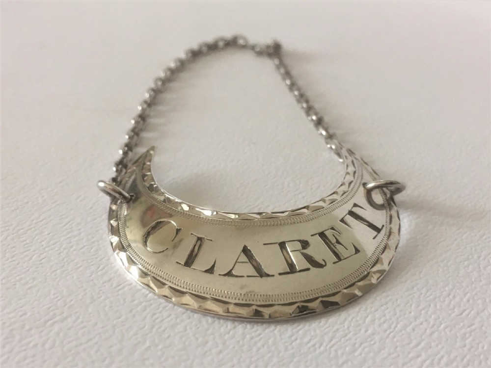 An 18th Century Sheffield silver Claret Label. View III