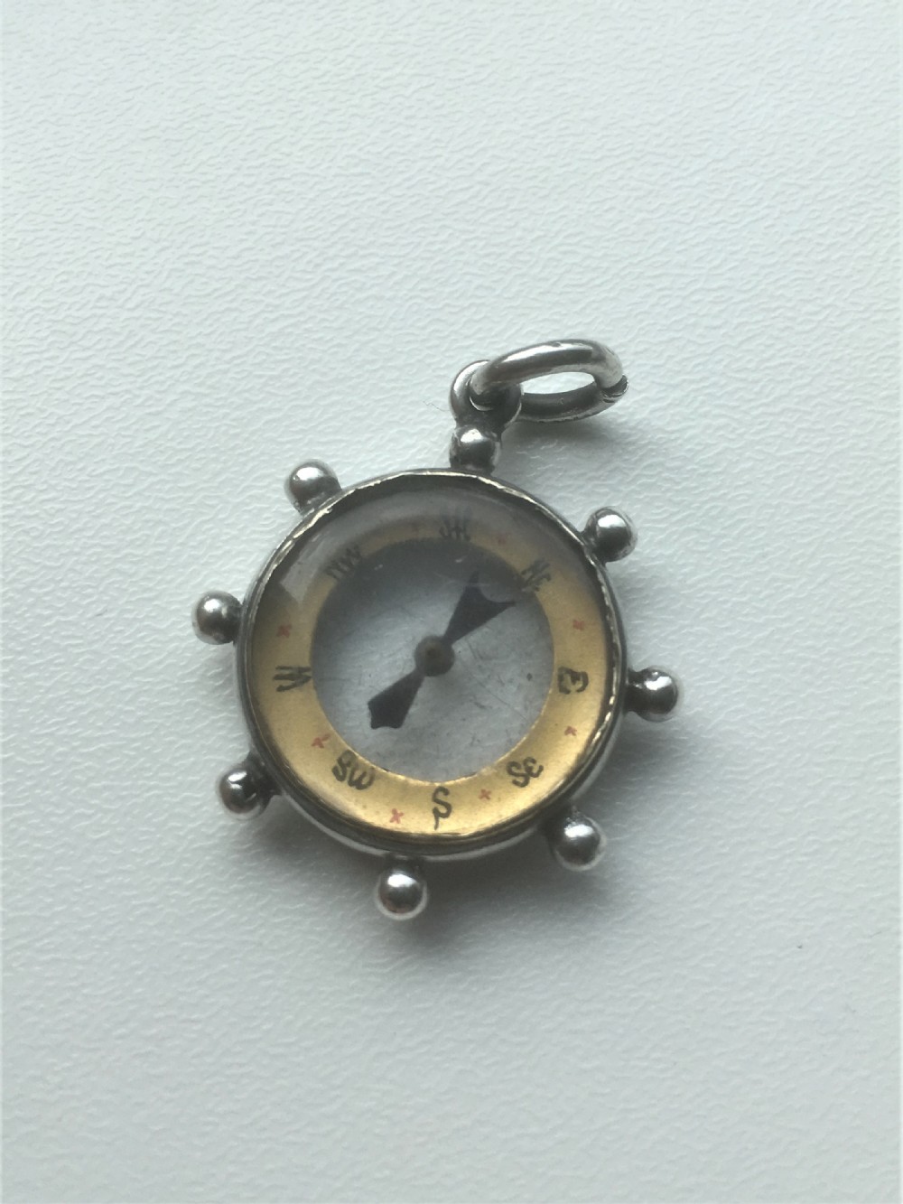 A novelty Victorian silver compass.