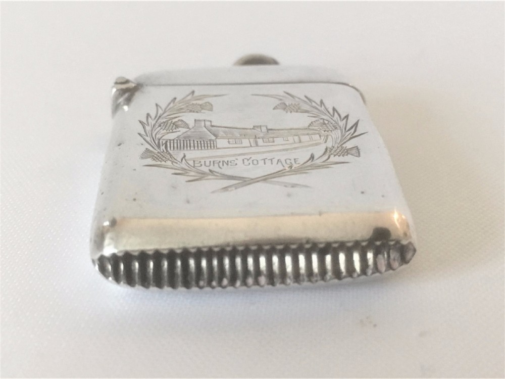 A rare 'Burns Cottage' engraved silver vesta. View VI