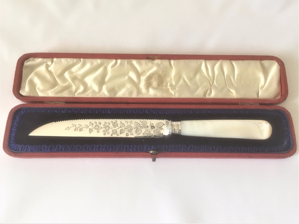 A boxed Edwardian silver Wedding cake knife. View II