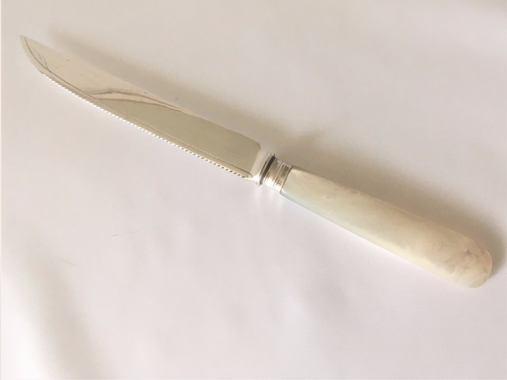A boxed Edwardian silver Wedding cake knife. View V