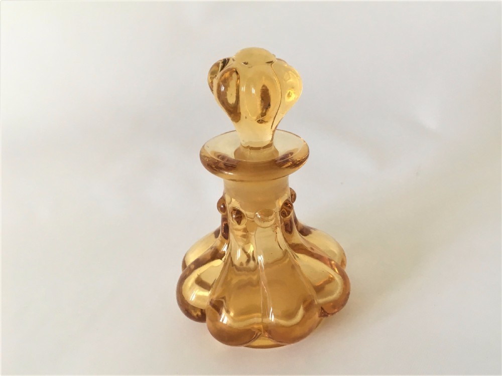 A French 19th Century amber scent bottle. View VI