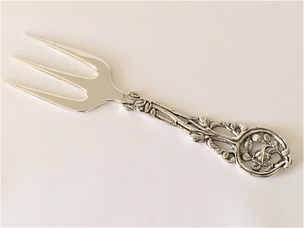 A  fabulous Edwardian tea table silver serving fork.