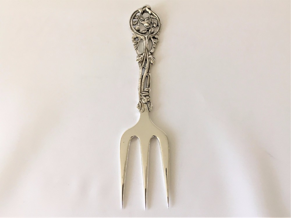A  fabulous Edwardian tea table silver serving fork. View III