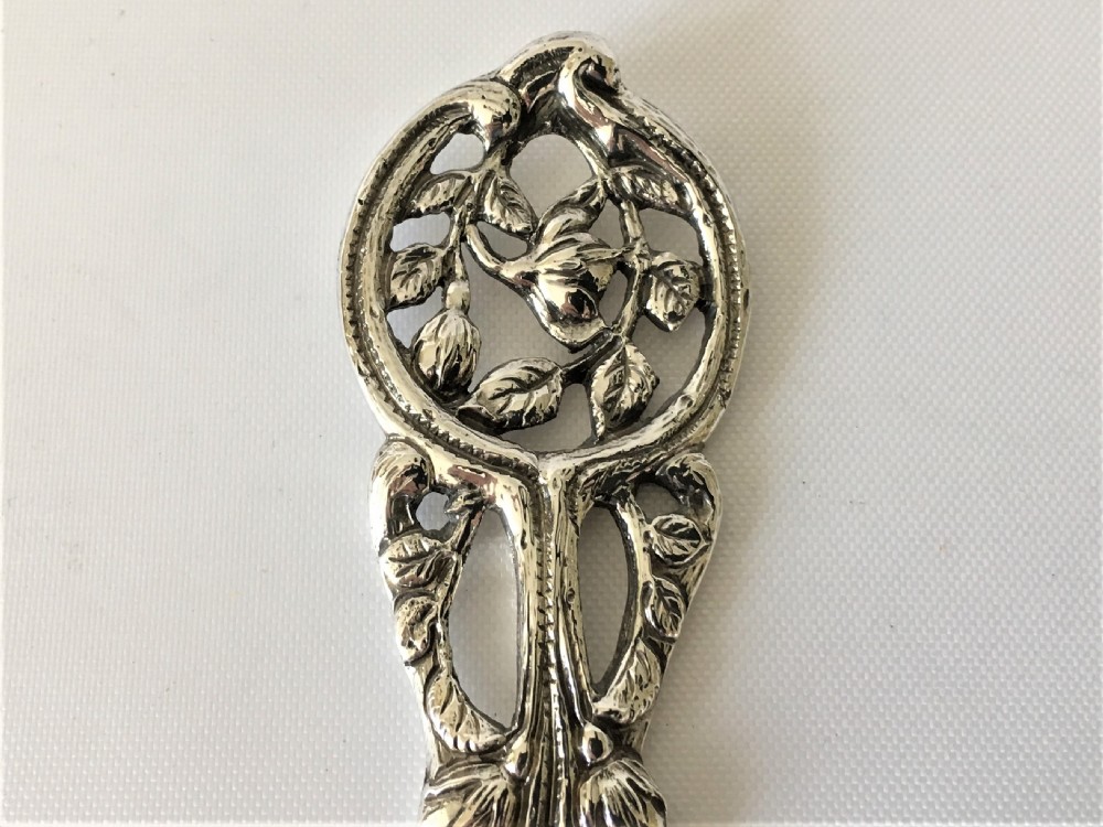 A  fabulous Edwardian tea table silver serving fork. View IV