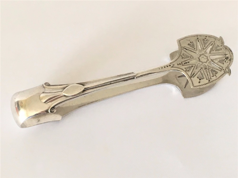 An extremely rare pair of silver Onslow pattern sardine tongs.