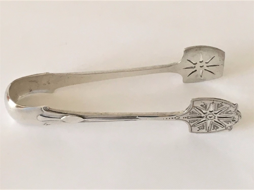 An extremely rare pair of silver Onslow pattern sardine tongs. View VI