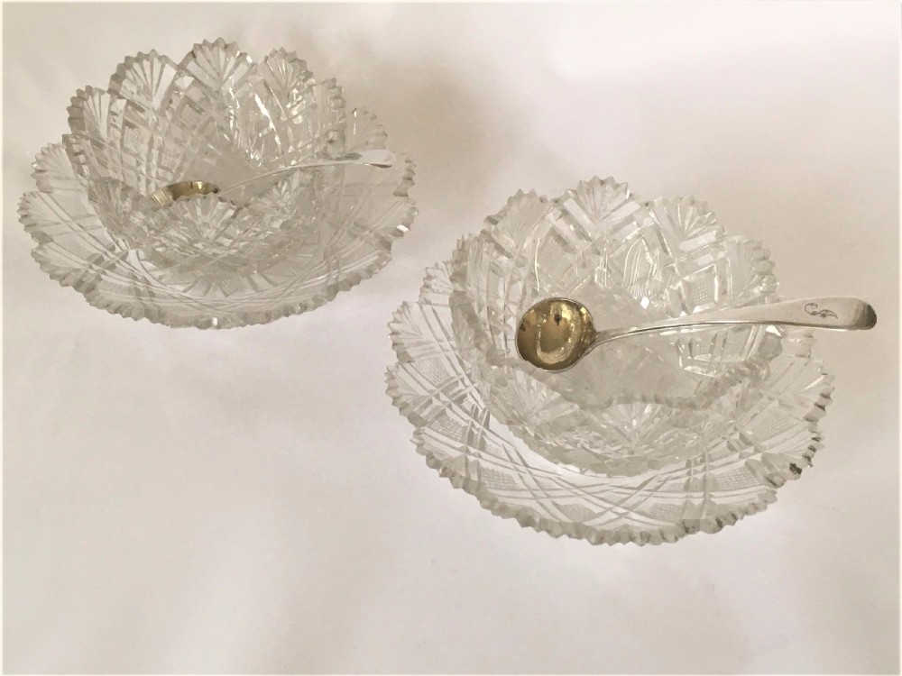 A fabulous pair of Regency cut glass condiment tubs & silver spoons. View IX