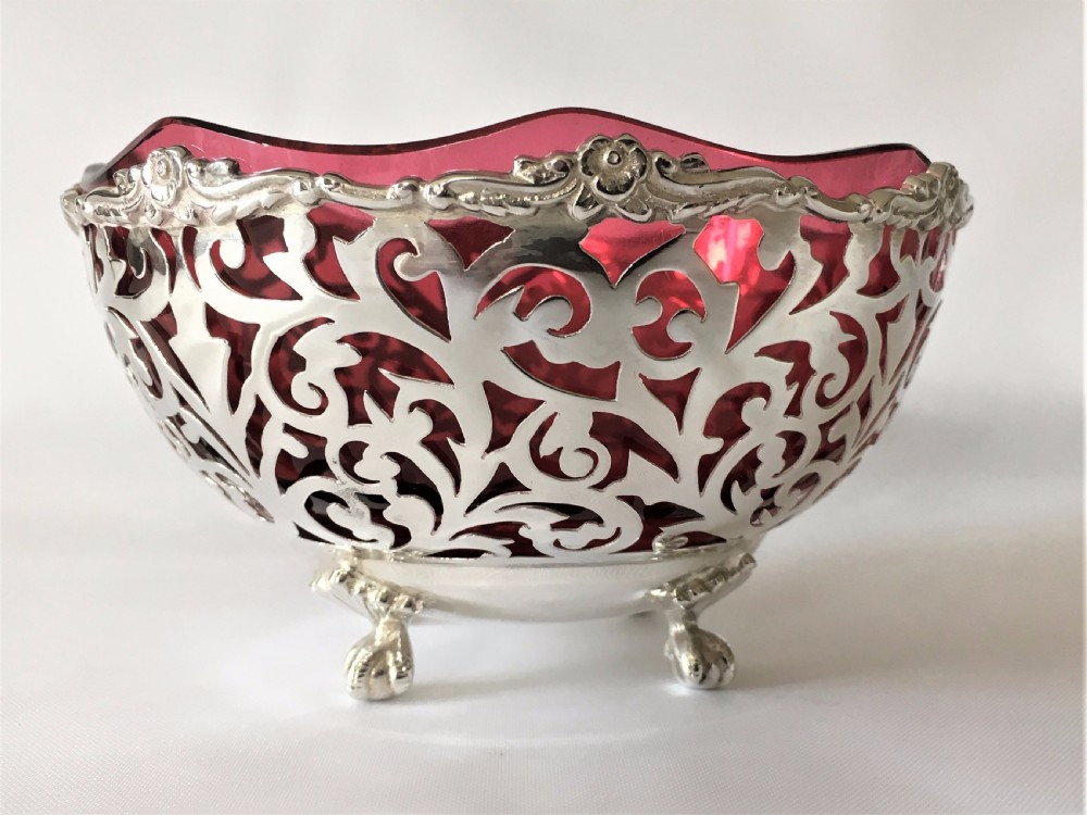 A stunning Edwardian pierced silver and cranberry bowl. View IV