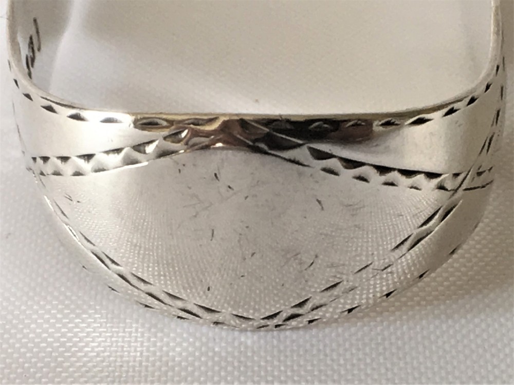 A gorgeous pair of 18th Century silver tongs. View VI