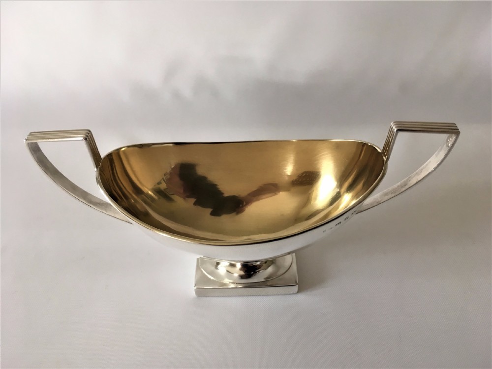 A fine Victorian silver gilt condiment boat. View III