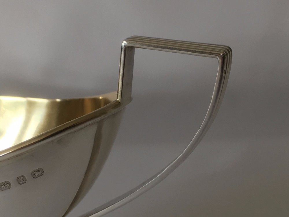 A fine Victorian silver gilt condiment boat. View VI