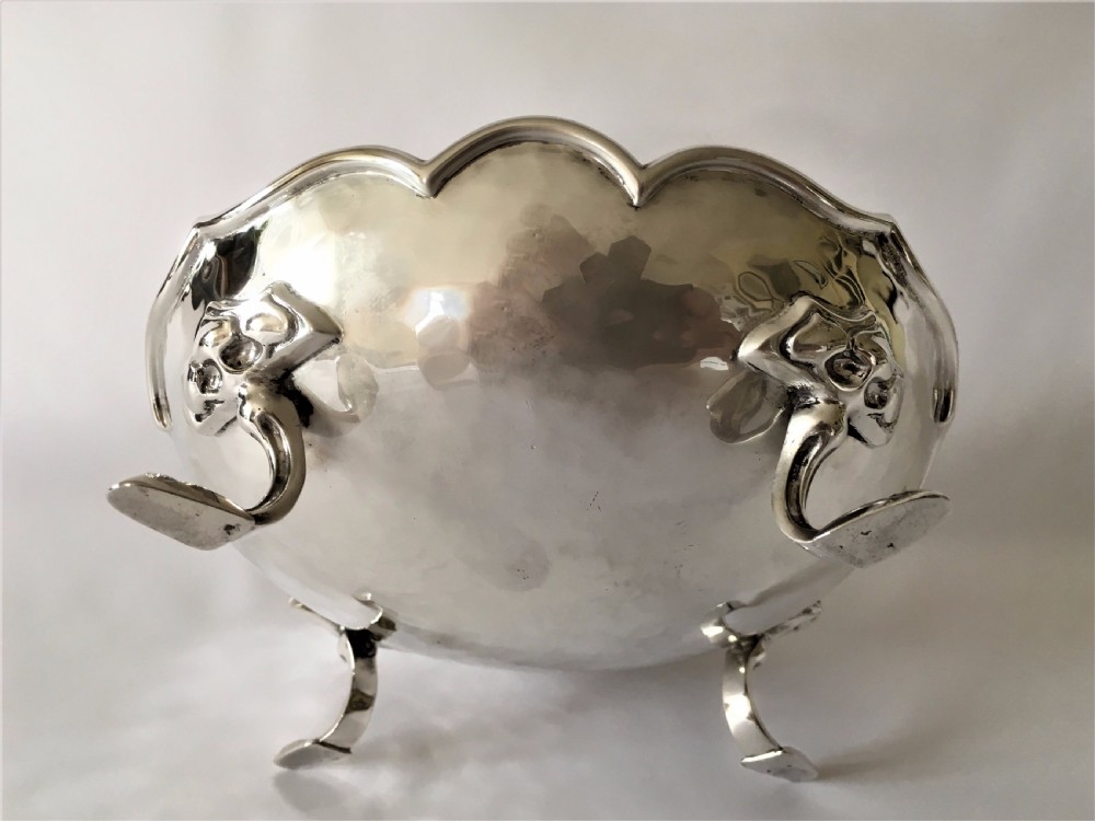 A fabulous Arts & Crafts hammered silver bowl.  View V