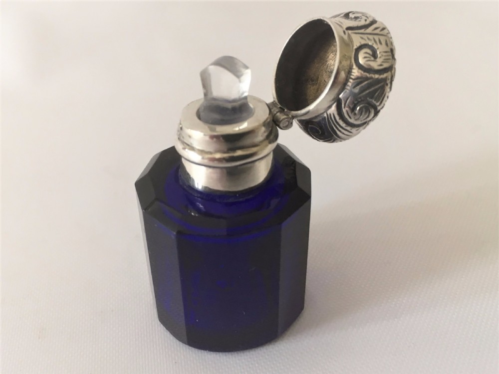 A Victorian silver mounted sapphire blue scent bottle. View II
