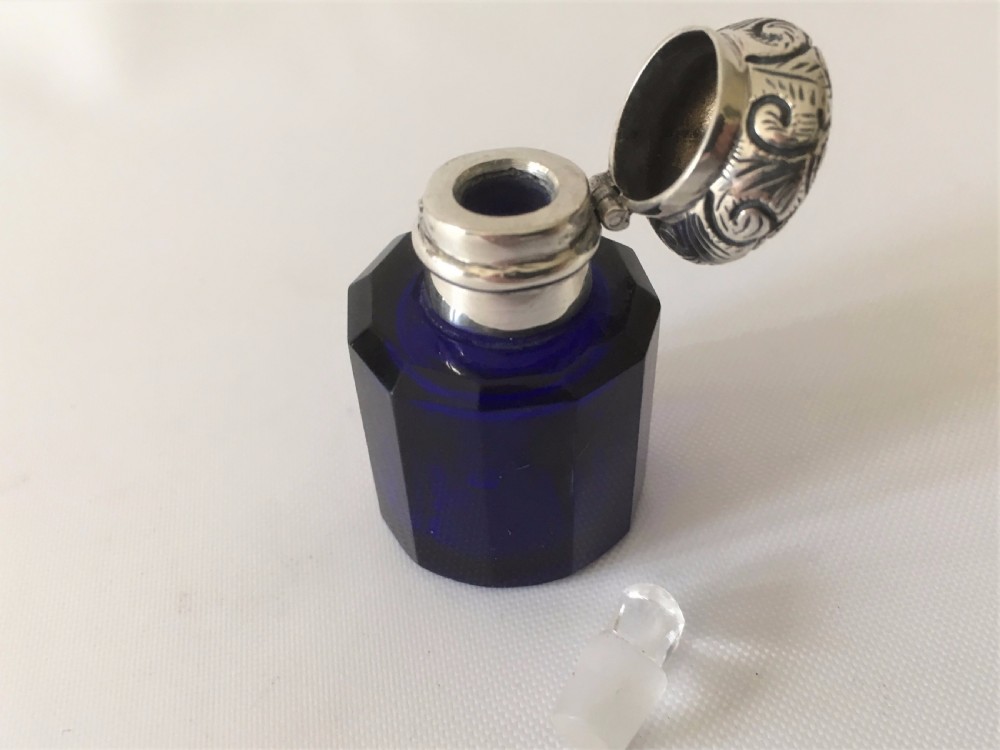 A Victorian silver mounted sapphire blue scent bottle. View III
