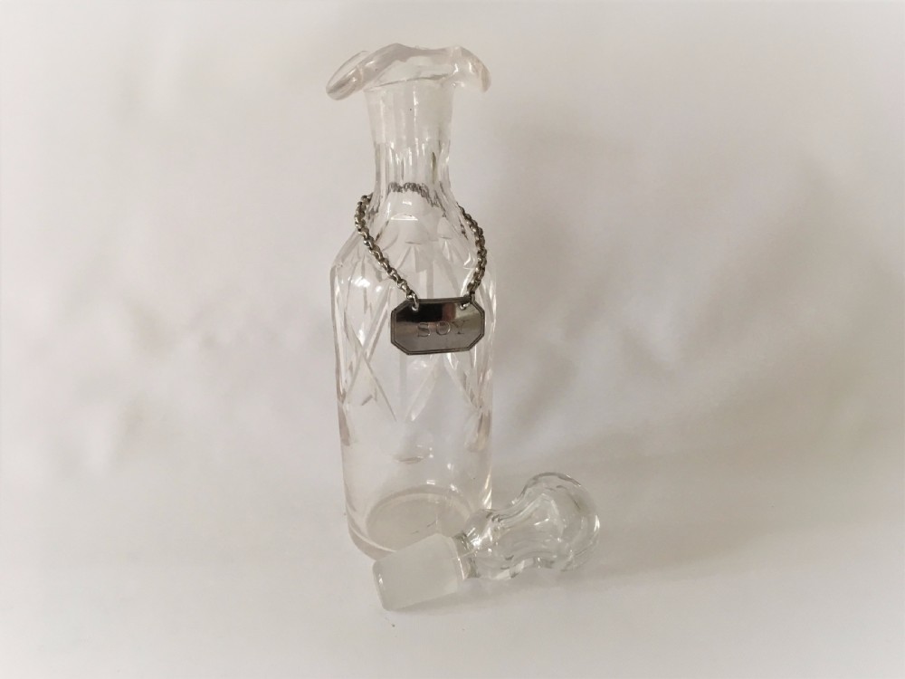 A rare Edwardian soy bottle with hallmarked silver label. View V