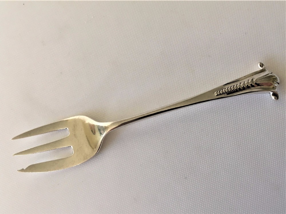 A rare Onslow pattern silver oyster fork.