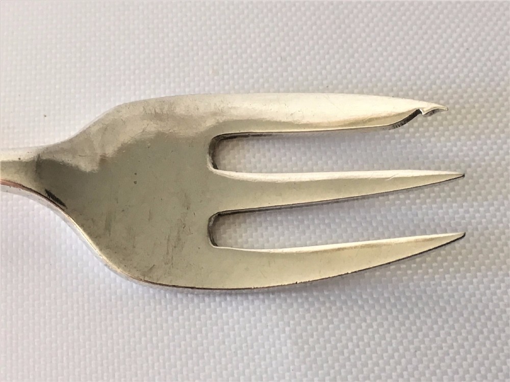 A rare Onslow pattern silver oyster fork. View V