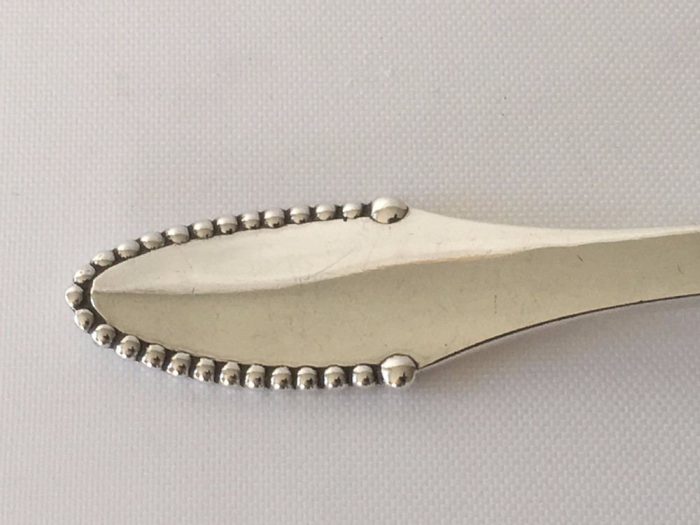 A superb Georg Jensen silver caddy spoon View II