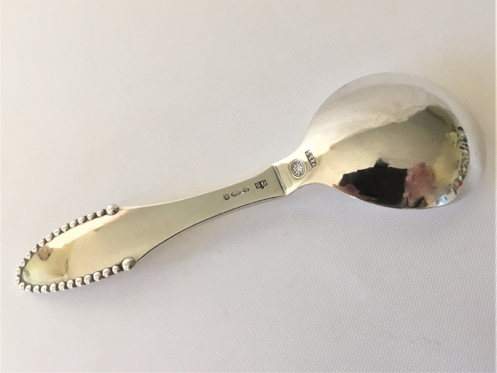 A superb Georg Jensen silver caddy spoon View IV