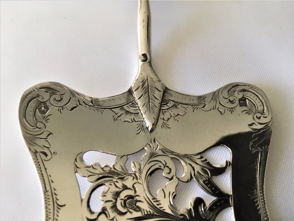 A fabulous Dutch silver pierced serving slice. View IV