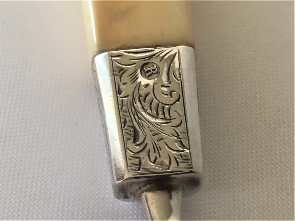 A fabulous Dutch silver pierced serving slice. View VI