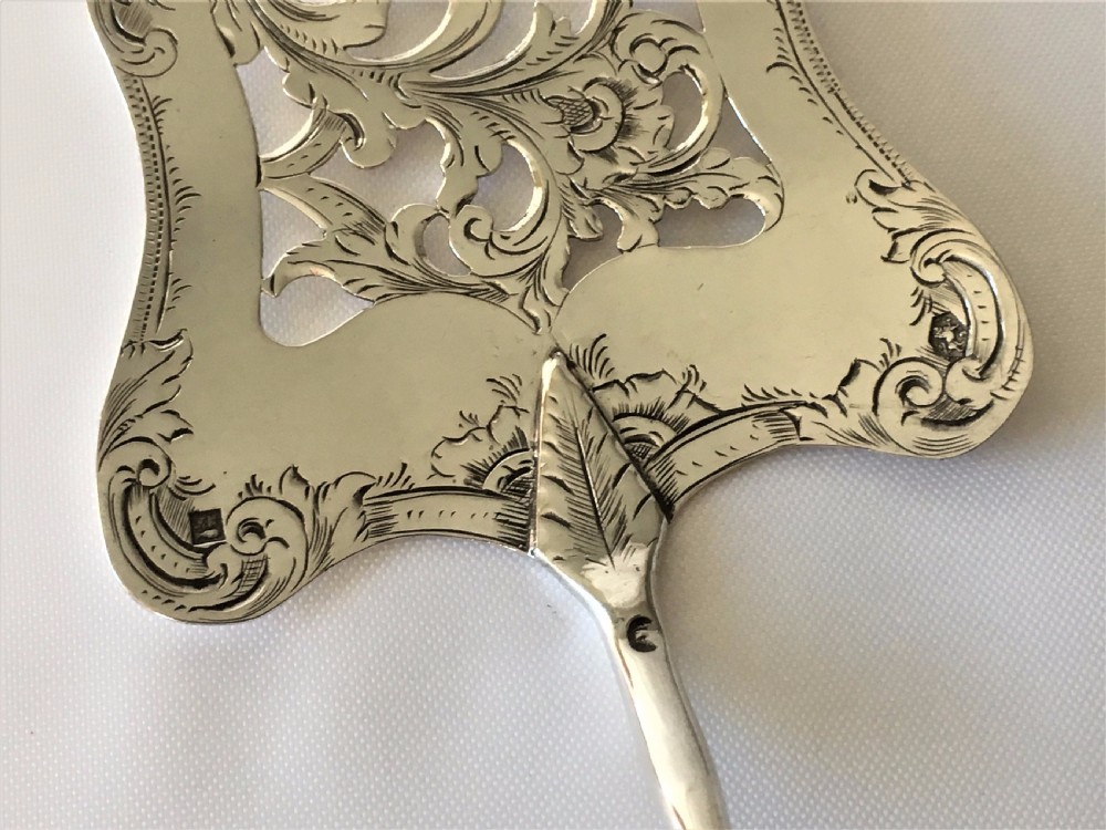 A fabulous Dutch silver pierced serving slice. View VII