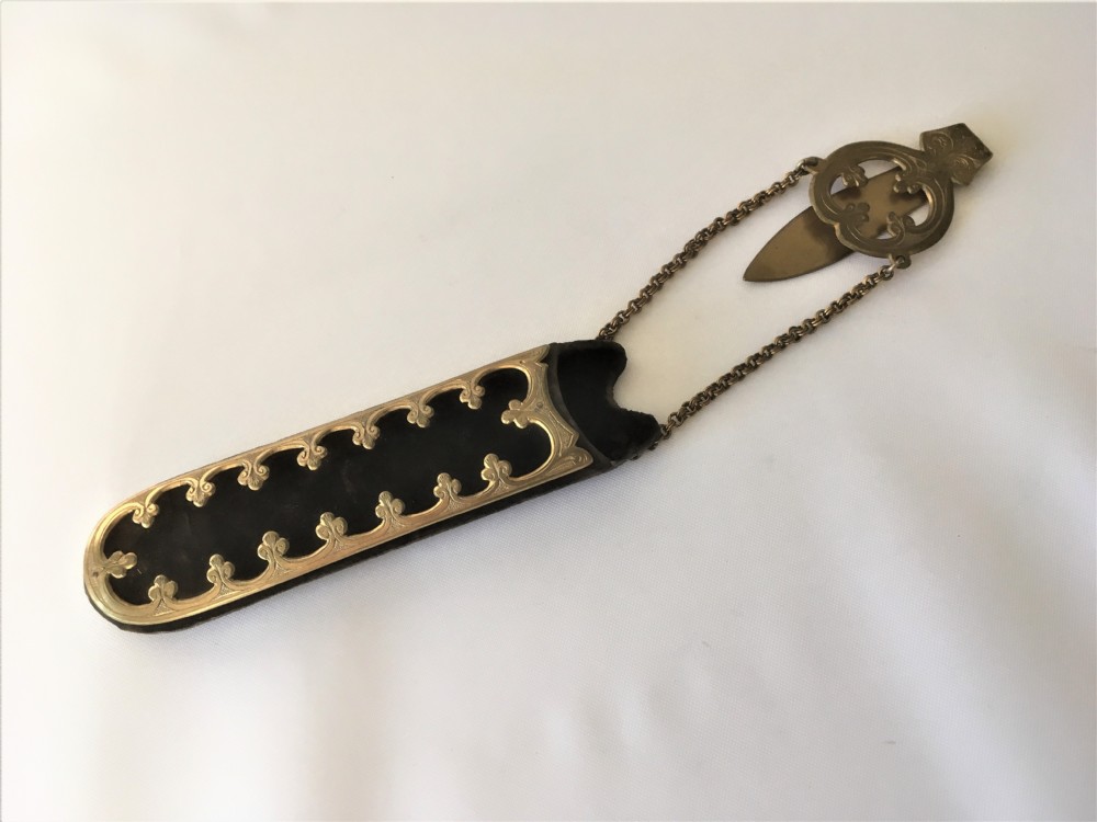 A Victorian ormolu and velvet spectacles case. 