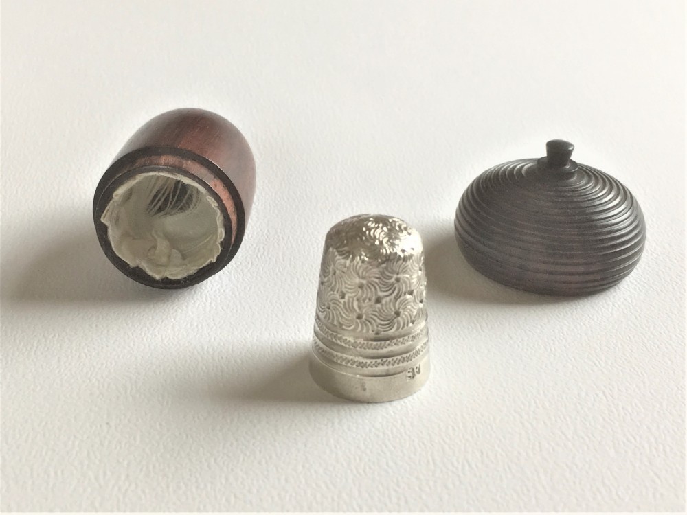 A gorgeous Victorian silver thimble in treen acorn case. View III