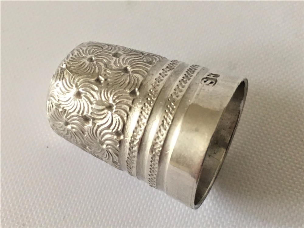 A gorgeous Victorian silver thimble in treen acorn case. View X