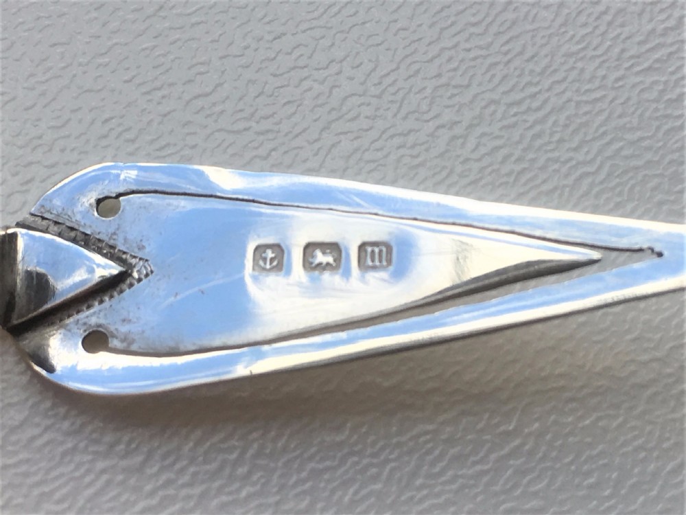 A charming Bright Cut silver trowel bookmark. View III