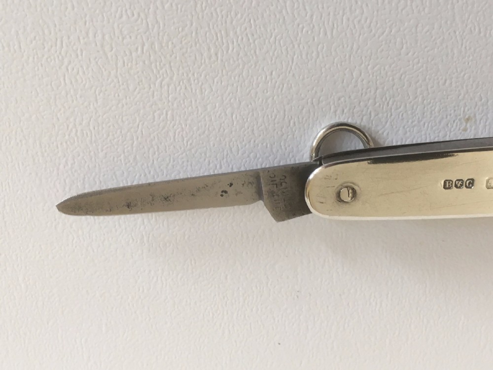 A rare silver folding knife and pencil combination View VII