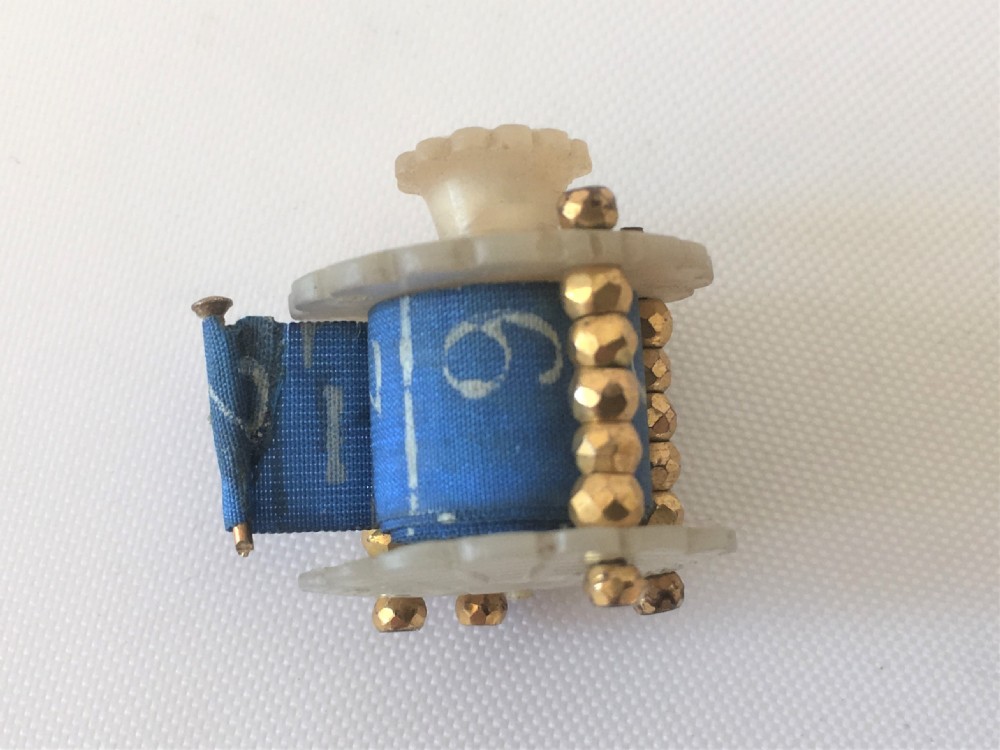 A Georgian mother of pearl tape measure