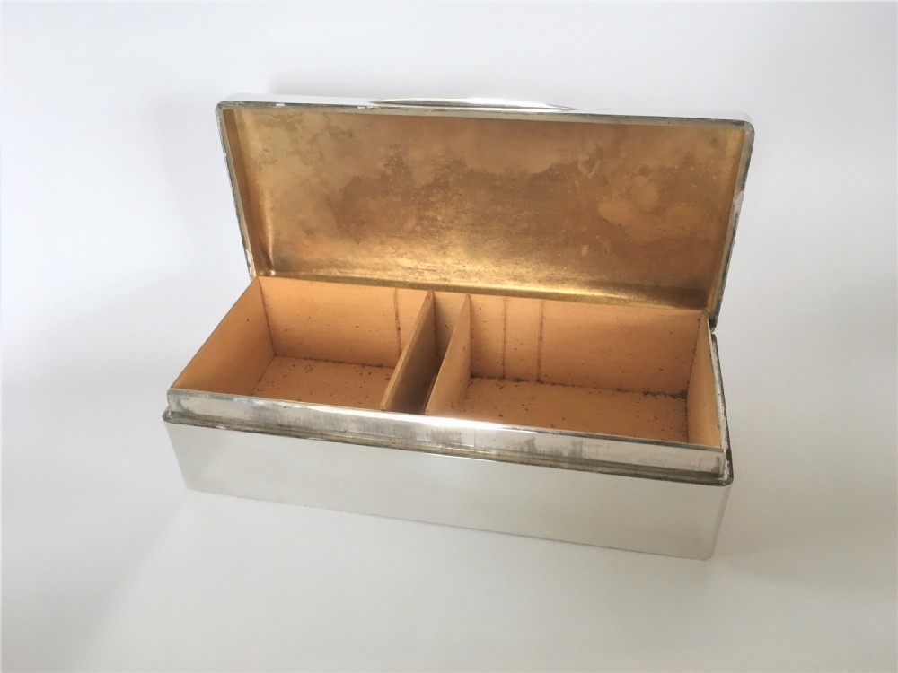 A superb silver table cigarette box. Malta Naval interest. View IV