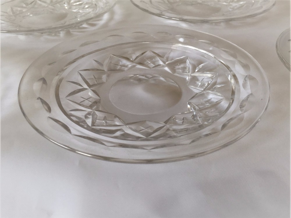 Six cut glass ice plates. View III